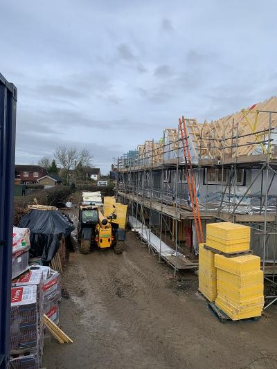 Roof Works Progressing on 8 New Terraced Houses at Burgess Hill, West Sussex