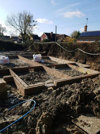 Groundworks Progressing for Construction Works of 8 New Terraced Houses at Burgess Hill, West Sussex 