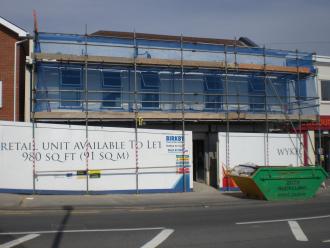 Exterior view of redevelopment of existing building into two large luxury apartments in Guildford Surry