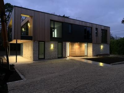 Front View at Dusk of Completed New House At Ryarsh, West Malling 